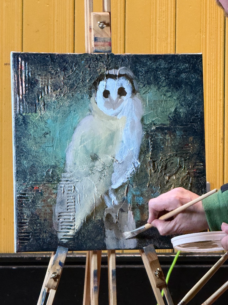 Abstract realism owl painting in progress showing textured acrylic background